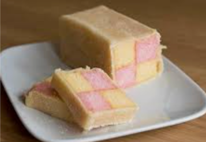 A Battenberg, with pink and white sponges and a marzipan coat.